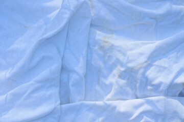 Obraz premium white fabric background of cloth from a piece of crumpled cloth