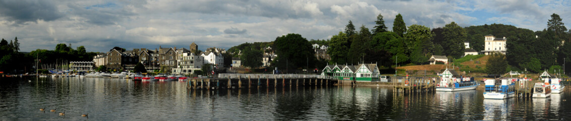 Idyllic Pier In Bowness-On-Windermere England Great Britain On A Beautiful Summer Day With A Few Clouds In The Sky