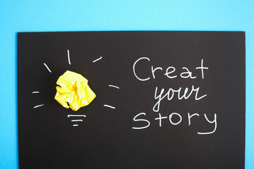 chalk marker writing on black daughter, create your own story motivational slogan, yellow crumpled...