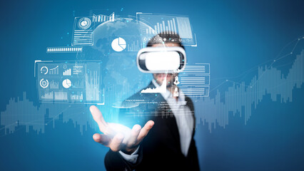 Skilled business man looking data analysis while planning strategy by using visual reality glasses. Professional smart investor checking financial graph holographic while wearing VR goggle. Deviation.