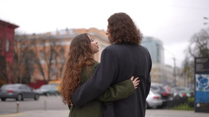 A couple cherishes a beautiful, romantic moment in the city, celebrating their love and deep emotional connection