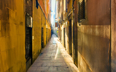 narrow street in gothic quarter for background without people