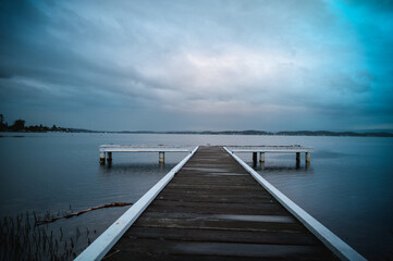 The photo shows a lakeside view located in Ken Lambkin Reserve