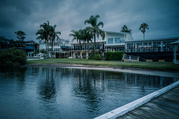 The photo shows a lakeside view located in Ken Lambkin Reserve