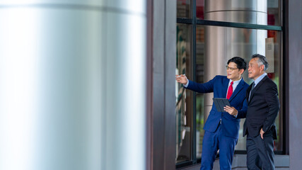 Asian businessman and senior manager business teamwork meeting discussion economy financial...