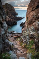 Obraz premium Dramatic rocky coastline with turquoise waters