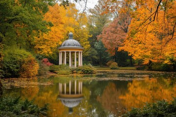 Fototapeta premium Autumn scenery with gazebo reflected in lake