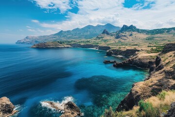 Fototapeta premium Breathtaking coastal landscape with turquoise waters and rugged mountains