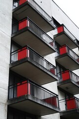 modern apartment building with red accents