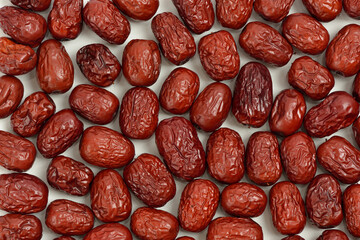 Close up of dried red jujube fruits on a white dish, South Korea