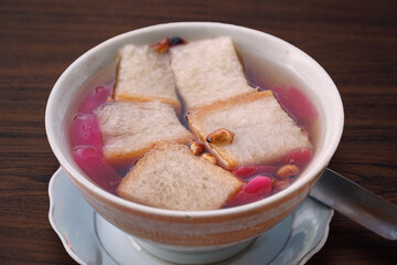 Wedang Ronde, a traditional Javanese dessert made of glutinous rice flour filled with peanuts, bread in ginger syrup