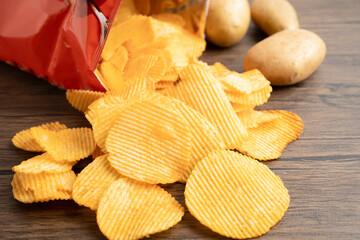 Potato chips , delicious BBQ seasoning spicy for crips, thin slice deep fried snack fast food.