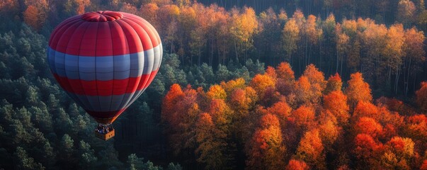Obraz premium Hot air balloon ride over a colorful autumn forest, serene weekend adventure