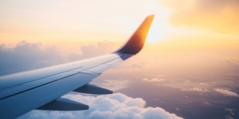 Obraz premium a plane's wing against a sunrise sky, symbolizing the beginning of an international journey