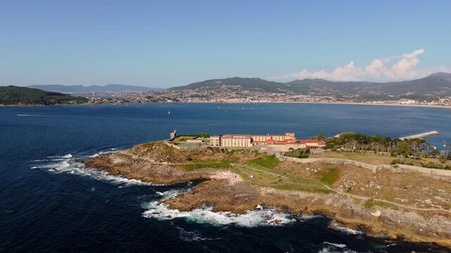 aerial - Monterreal Castle on a rocky peninsula in Baiona, Spain, overlooking the Atlantic