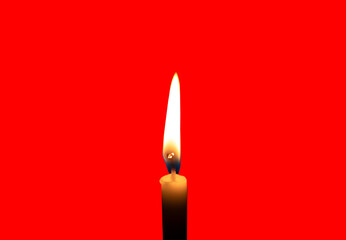 A single burning candle flame or light glowing on a small white candle isolated on red background...