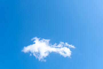 Low angle view of beautiful blue sky with strange shape of clouds in the morning or evening used as natural background texture in decorative art work