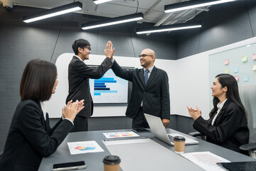 Asian business people team analyzing statistics financial. Group Team of ceo business man and woman Meeting Conference Discussion various topic. Executive professional managers Corporate in office.