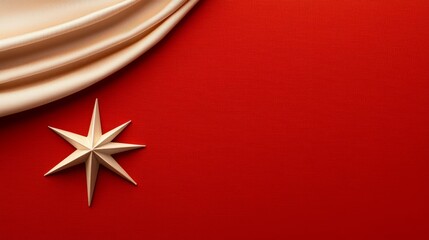 Red background with a golden star and flowing beige fabric.