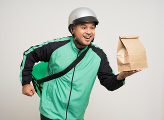 Young asian rider wearing green jacket uniform and helmet various action holding a lot of paper parcel delivery box to customer. Man service worker Courier and shipping food delivery service.