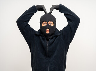 Thief in uniform black jacket various pose on isolated background. The Robber terrorism criminal...