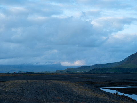 clouds over landscape in iceland