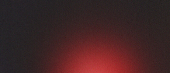 Red blurred gradient on dark grainy background, glowing light spot, copy space
