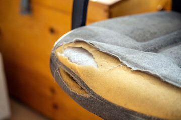 Worn yet resilient, this office chair embodies a narrative of labor and time a testament to countless hours of work and dedication. It symbolizes both endurance and the inevitable wear of daily life