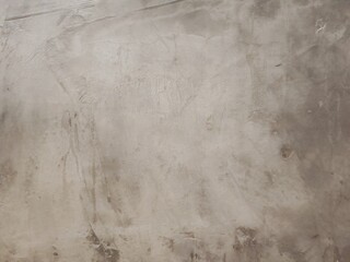 Weathered Concrete Wall Texture: A close-up shot of a textured, weathered concrete wall with subtle variations in shade and an organic pattern.