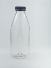 Transparent PET bottle isolated on white background