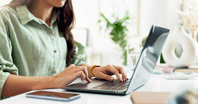 Hands, typing and person in home office with laptop, research or networking for freelance project. Remote work, connectivity and woman at desk writing email, report or online review for business plan