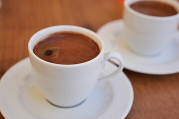 a cup of turkish coffee on table 