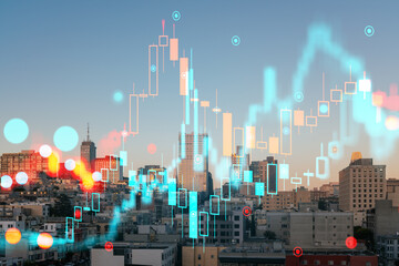 San Francisco skyline with financial data overlay at sunset.