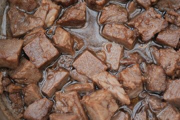 A Delicious and Savory Dish of Cubed Meat Cooked in a Rich and Flavorful Broth, Ideal for Any Meal