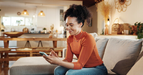 House, smile and woman on sofa, smartphone and typing with social media, internet and relax....