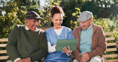 Caregiver, senior men and tablet for telehealth, daily schedule and wellness app in retirement....
