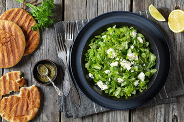 Classic Greek green lettuce salad with feta cheese