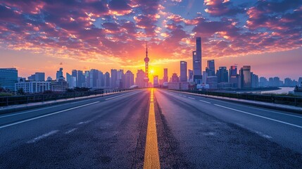 Fototapeta premium Asphalt road and city skyline with modern buildings at sunset in Shanghai 