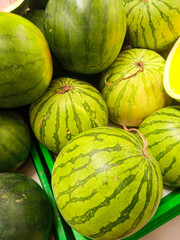 pile of fresh watermelons in the supermarket