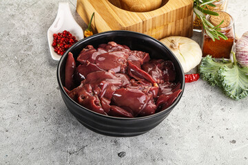 Raw uncooked chicken liver in the bowl