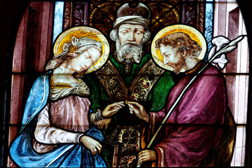 Stained glass of Holy family: The wedding of Mary and Joseph. . © Joan