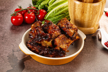Grilled pork ribs in barbecue sauce