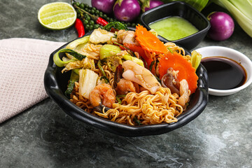 Asian cuisine - Fried noodles with seafood
