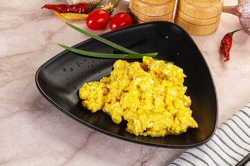 Scrambled egg in the bowl