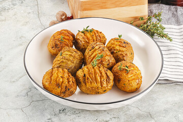 Baked baby potato with thyme