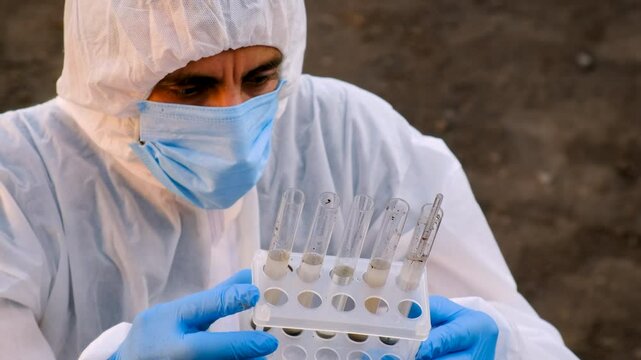 Taking soil samples in nature. Selective focus.