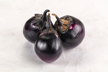 Raw violet and black eggplant