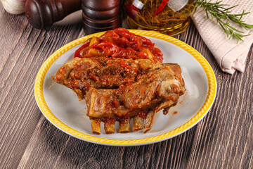 Baked lamb ribs with vegetables