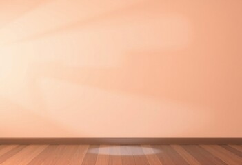 Empty room with peach wall and wooden floor.