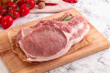 Raw potk loin steak with bone